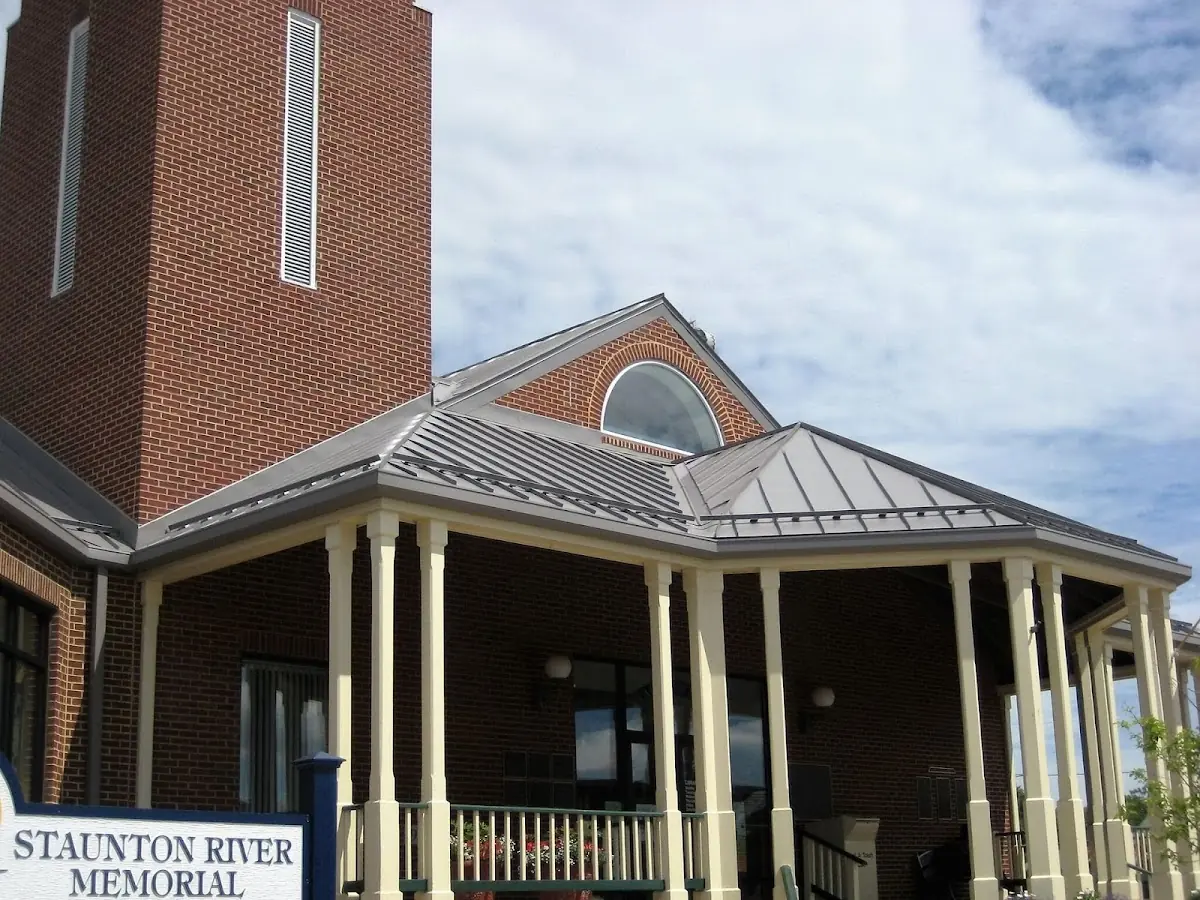 Skilled roofing craftsmen working on a residential roof in Wrights Crossroads